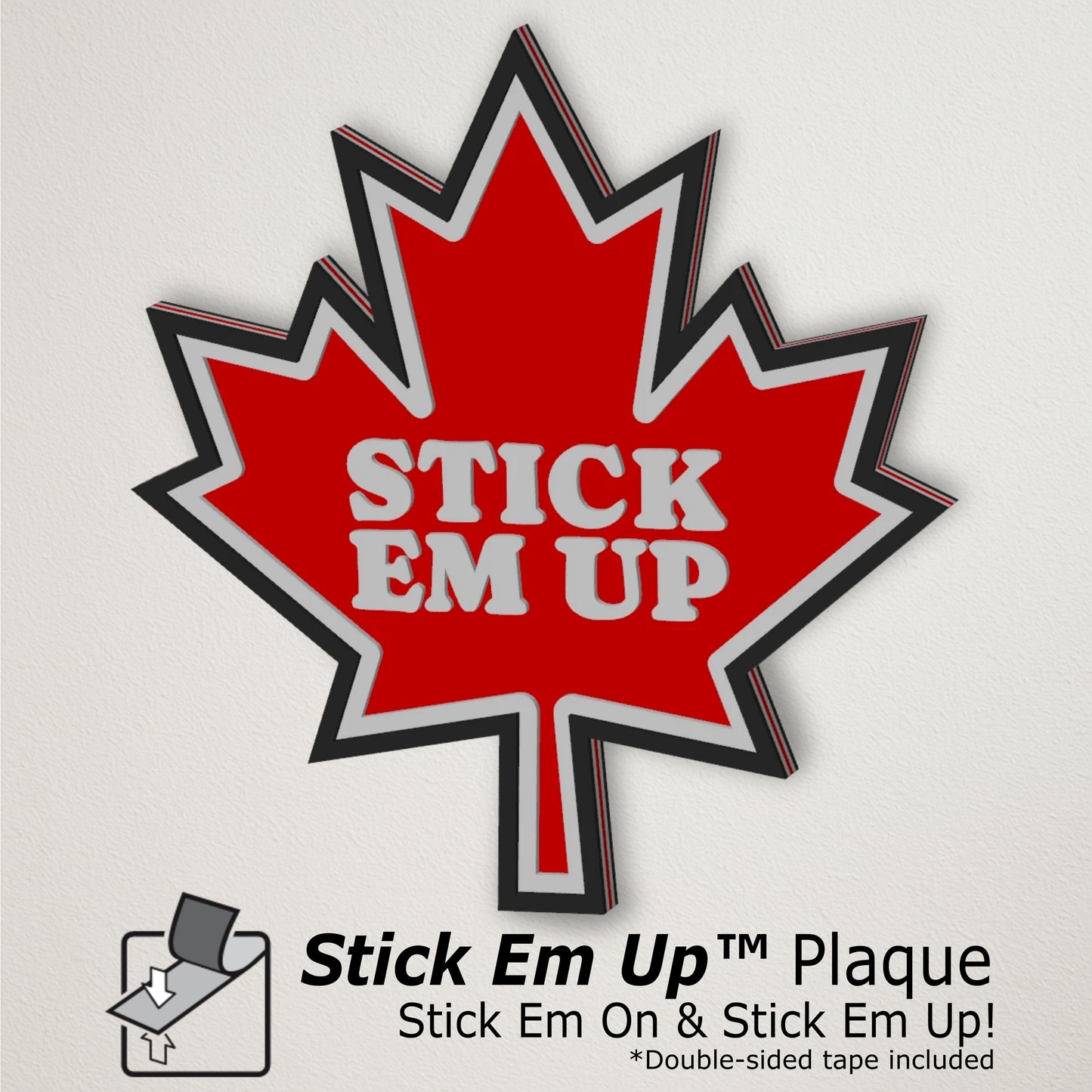 Red maple leaf-shaped 'Stick Em Up' plaque on a clean wall background