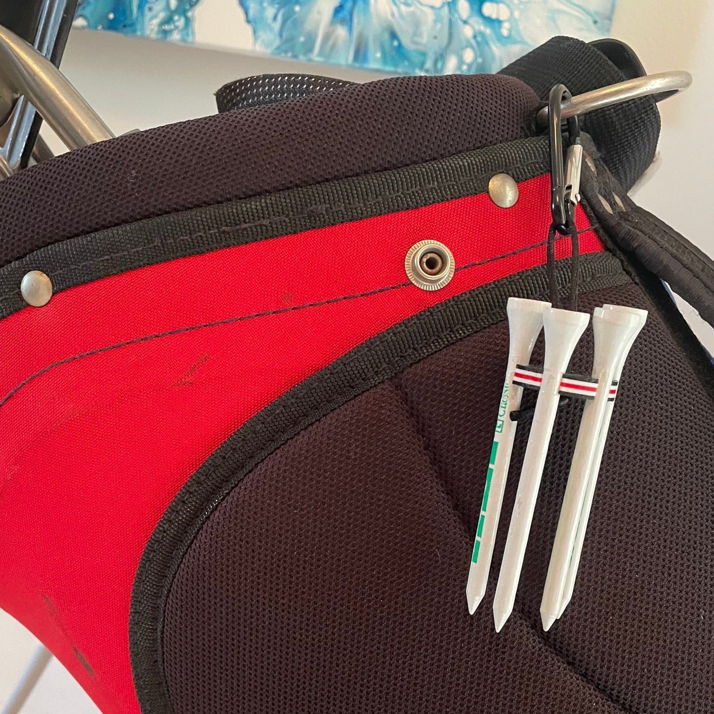 Golf Tee Holder - Black White Red - Clipped to Golf Bag - Close Up View
