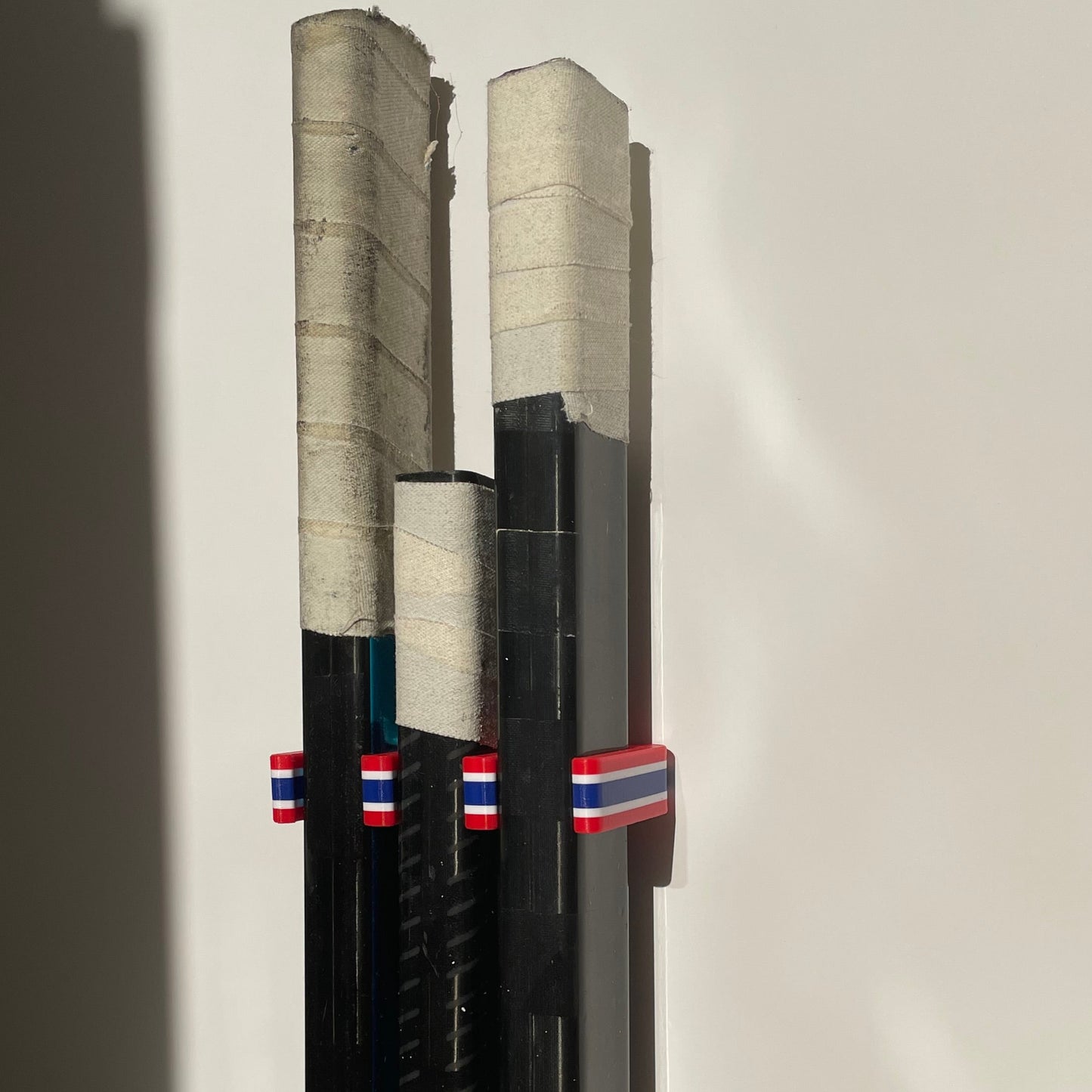 Stick Em Up Hockey Stick Holder - Red White Blue - Mounted Hockey Stick Rack - Isometric View