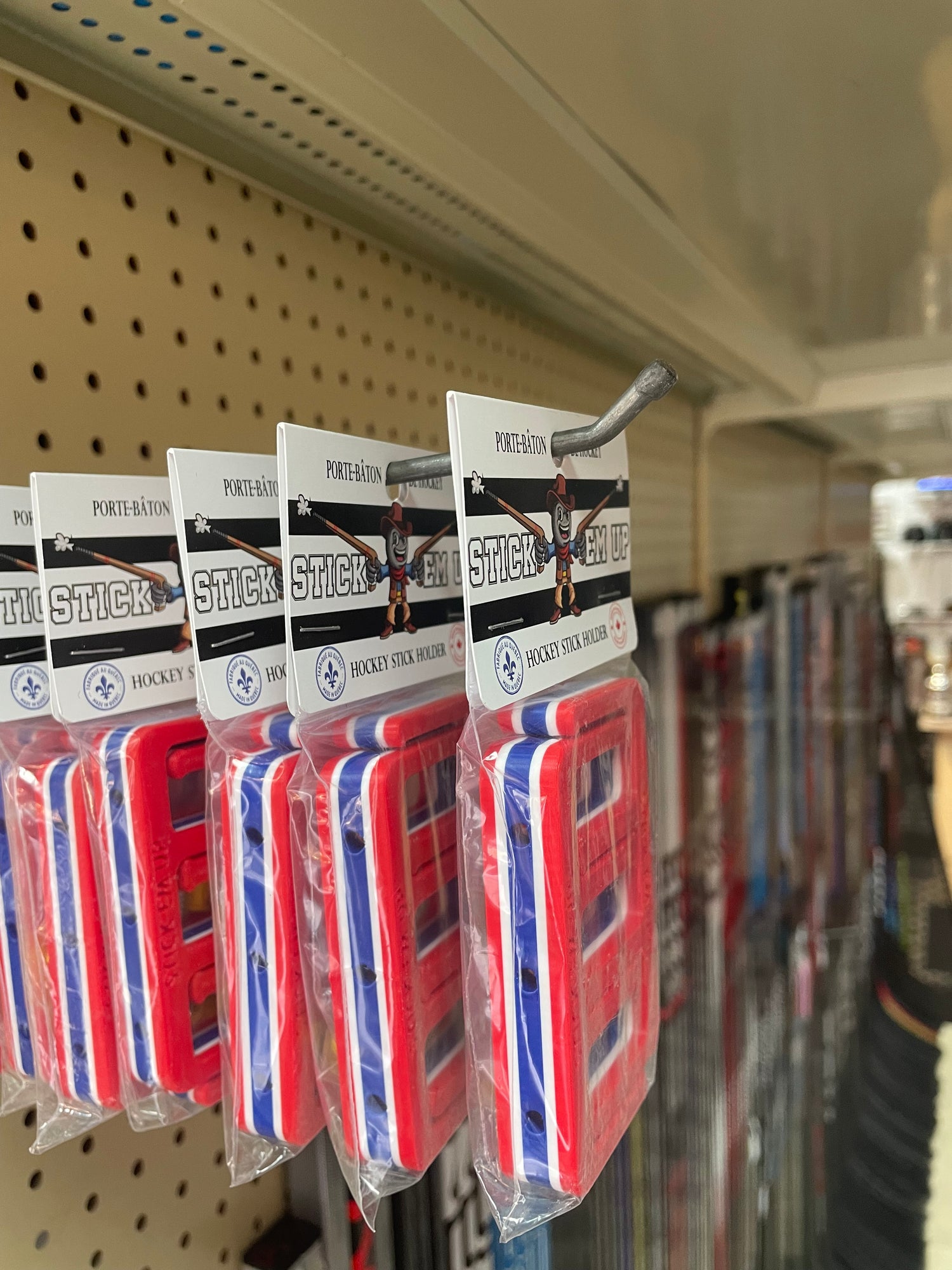 Stick Em Ups on pegs at Sport Au Gus store - foreground - sticks background - Red White Blue