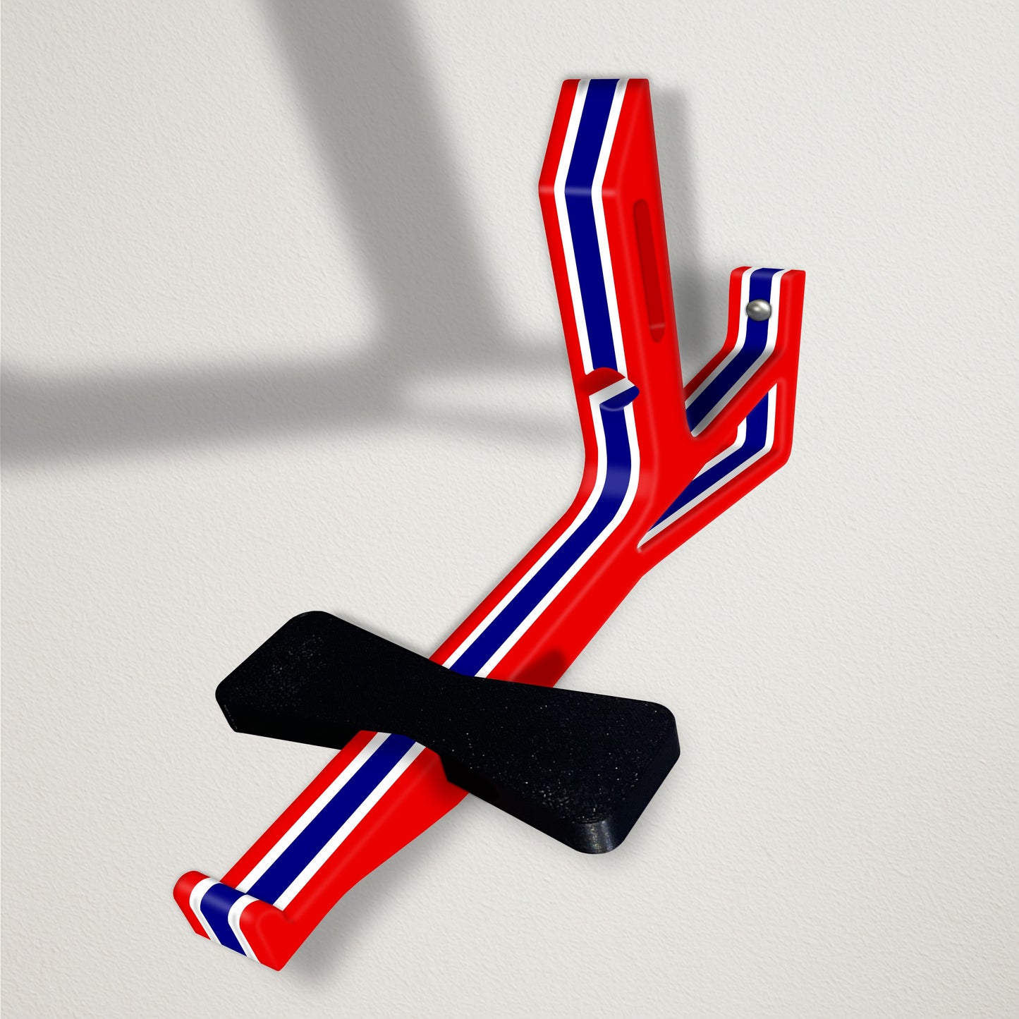 Angled baseball cap butler display organizer mount - red with thin white accents and a thick navy stripe on a clean wall