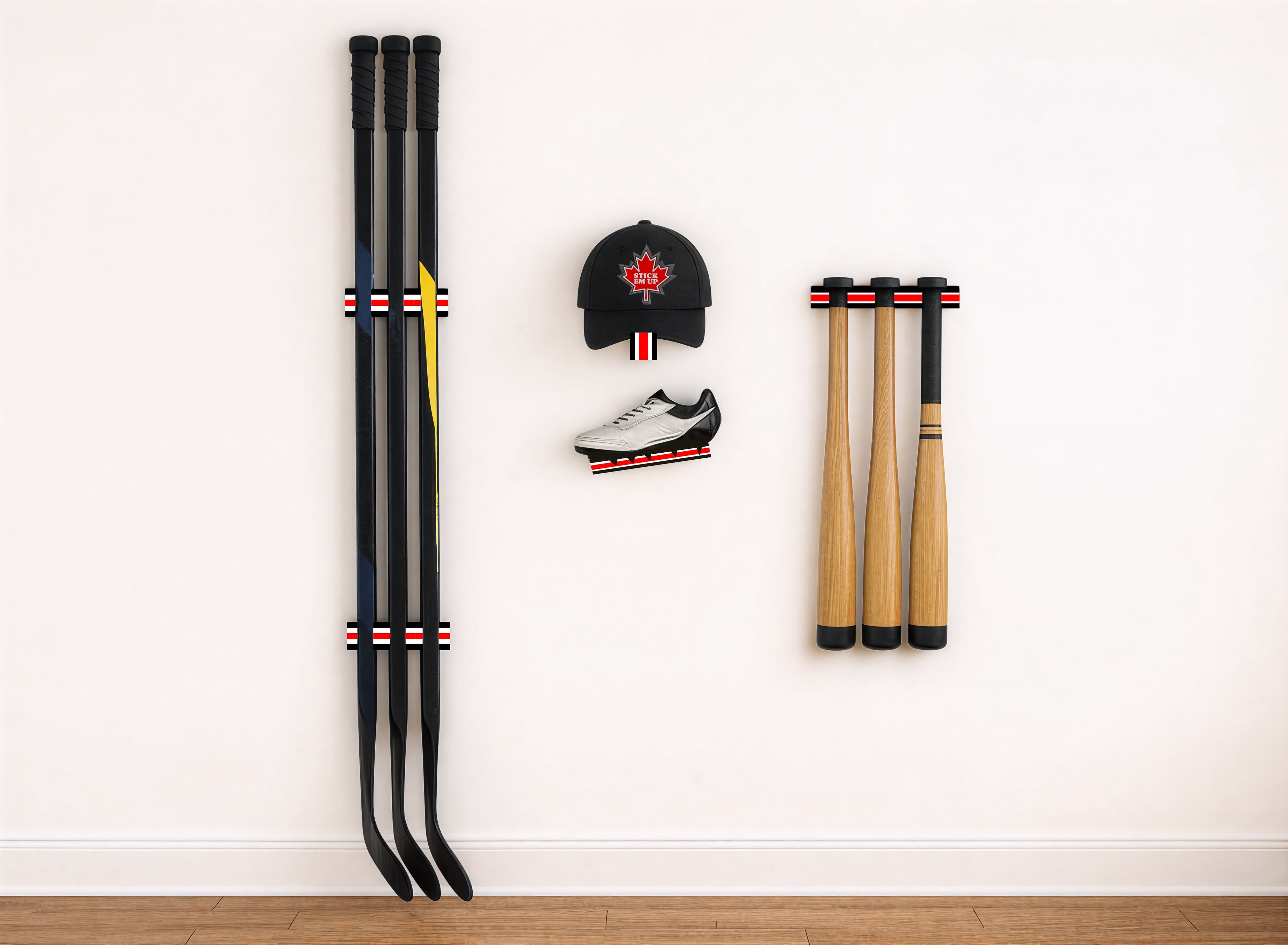 Sports equipment mounted on a clean wall with the black, white and red team Canada stripes