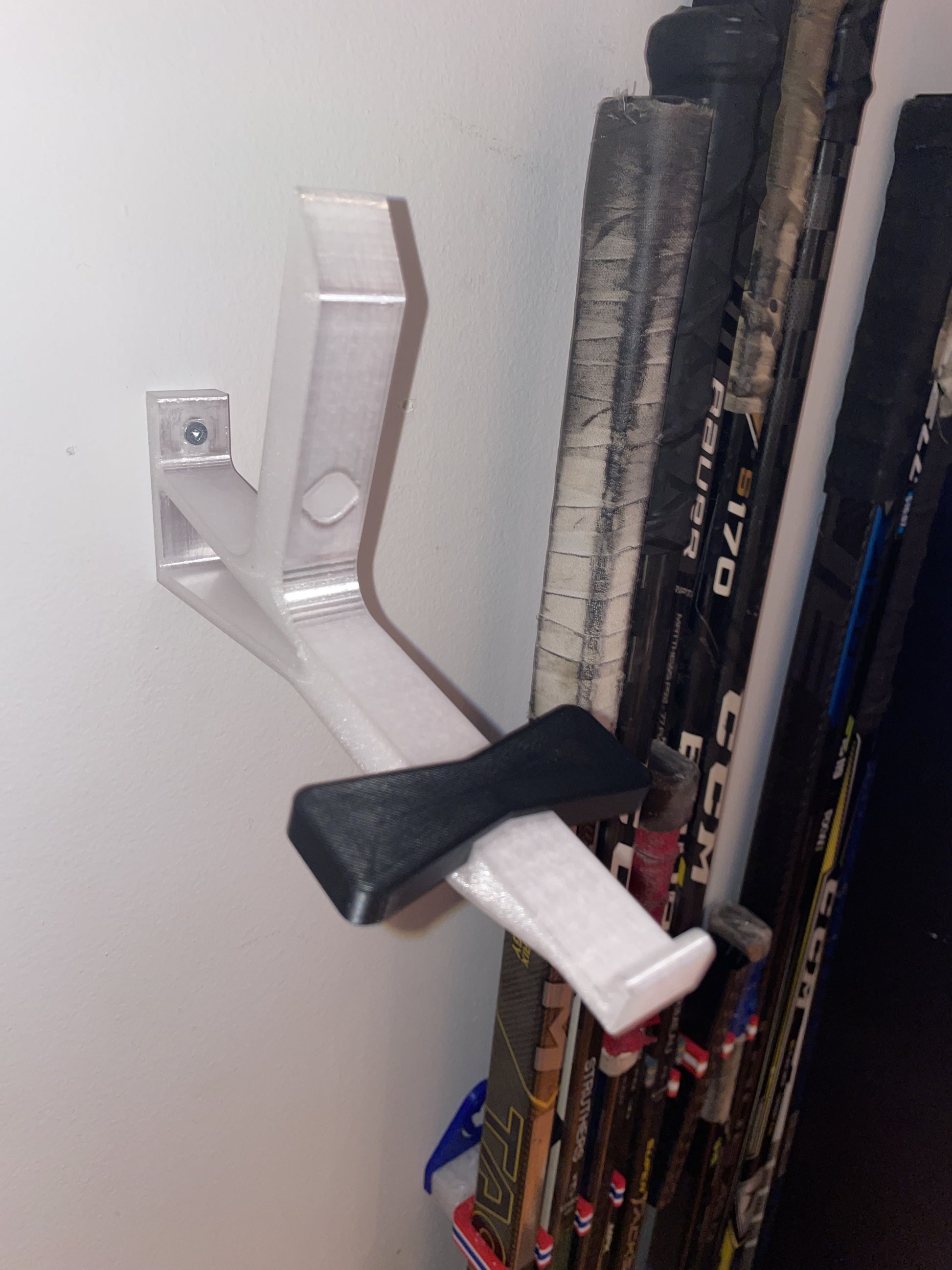 Ice-colored cap butler assembly mounted on a white wall without  a cap